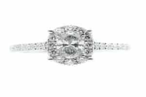 14 Karat White Gold Halo Engagement Ring with One Oval Diamond